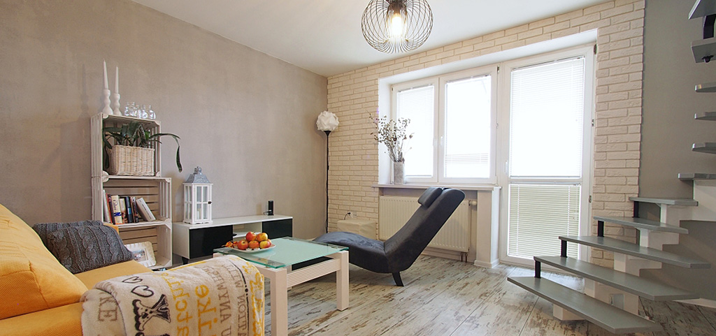 zdjęcie przedstawia salon w nowoczesnym apartamencie na sprzedaż w Tarnowie