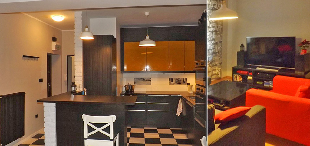 zdjęcie przedstawia aneks kuchenny oraz fragment salonu w apartamencie do wynajęcia w Katowicach