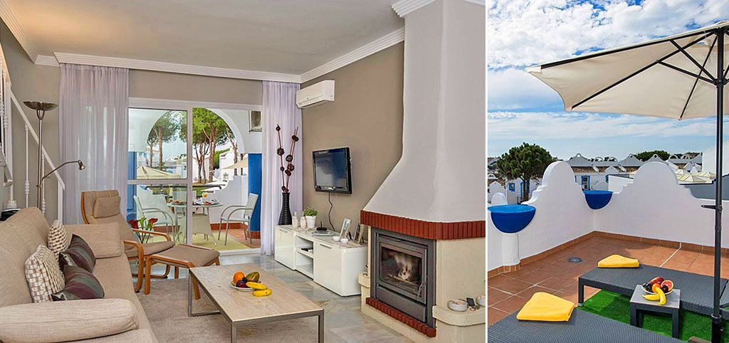 na zdjęciu luksusowy salon z kominkiem oraz fragment tarasu w luksusowym apartamencie do sprzedaży w Hiszpanii